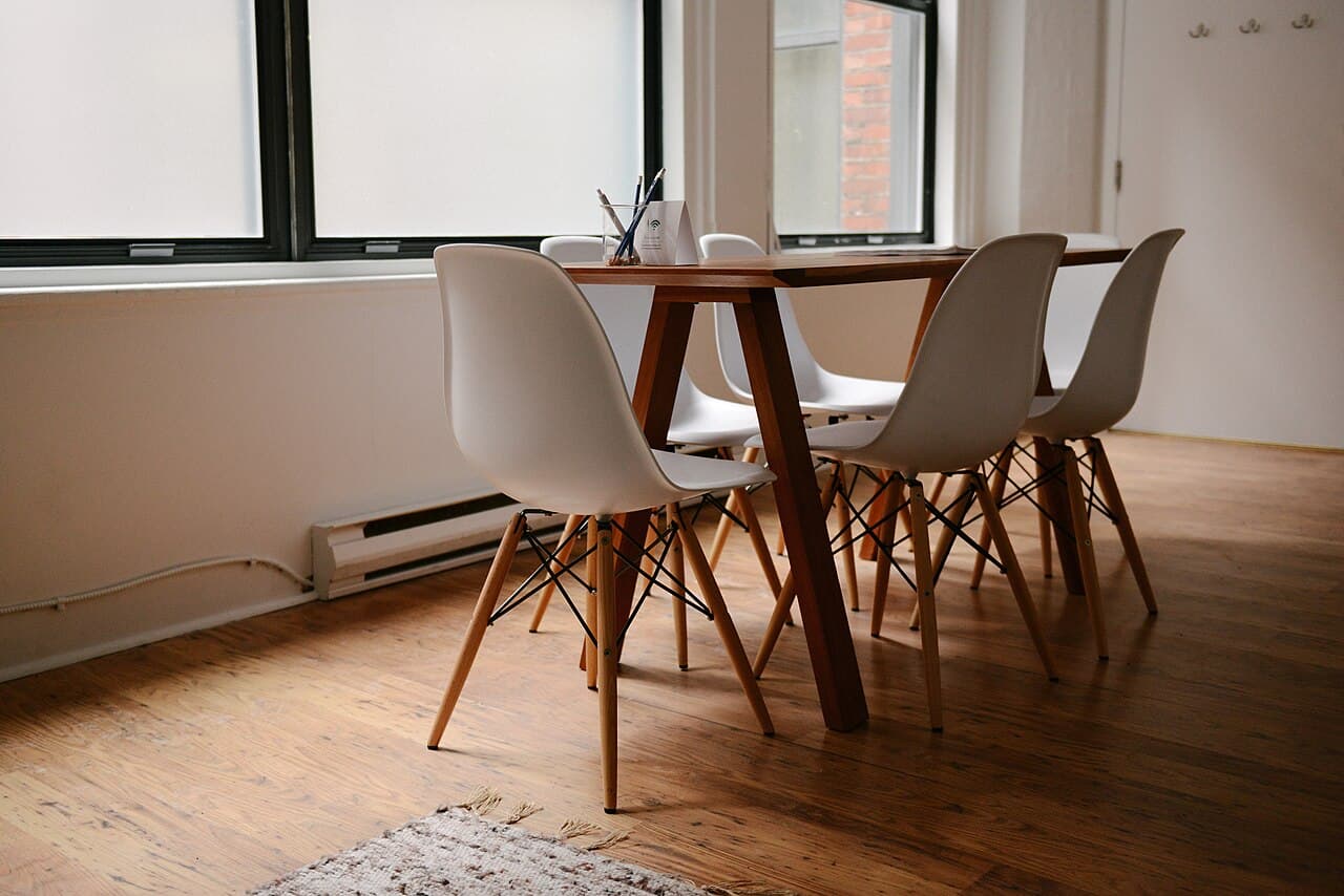 Modern meeting room with chairs arranged around a table