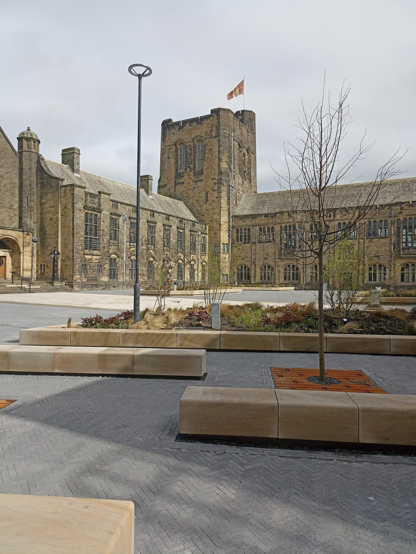 An open university courtyard framed by building wings